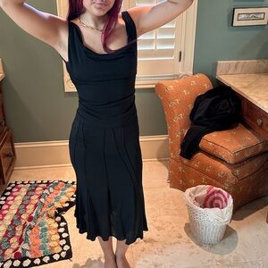 Moschino cocktail dress with draping low neck, fitted bodice, flounce bottom